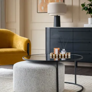 Thea smoked mirror coffee table and light grey fabric pouffe set
